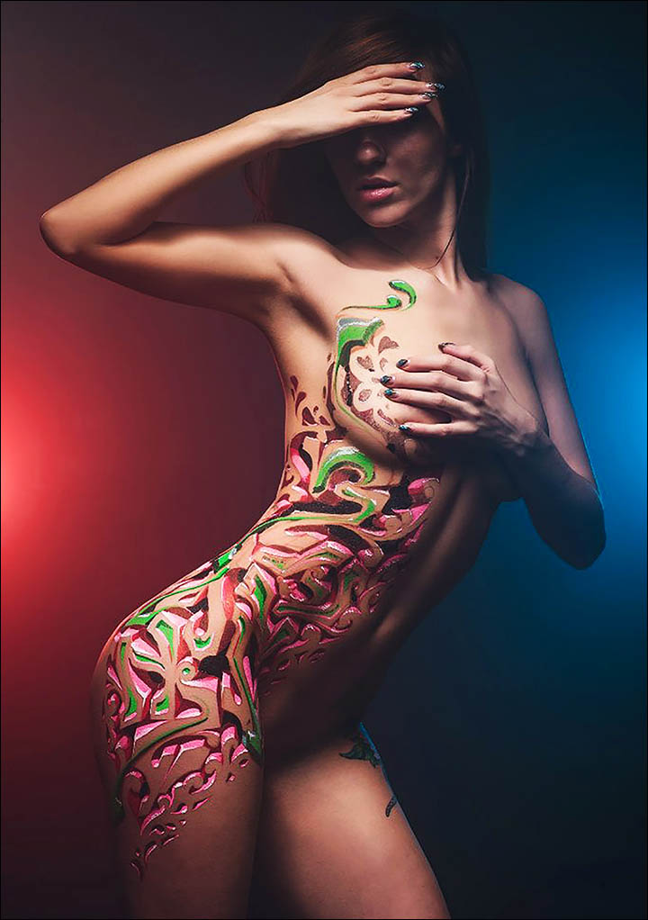 Young women queue to be painted naked by 20 year old body artist Pavel Dorofeev aka Pasha Znag.