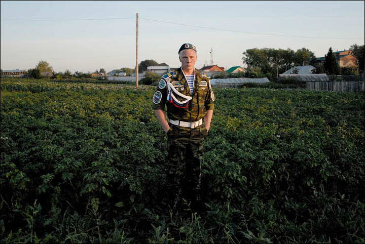 Soldier at potatoes field