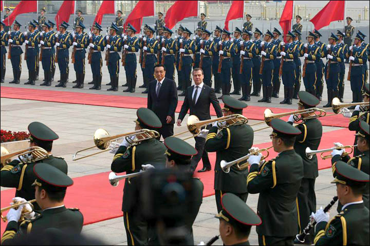 More than 20 new deals on energy, investment and education are inked in Beijing . 