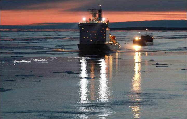 Shoreline on remote island retreats by 74 metres in seven years due to increased wave power of unfrozen sea, and thawing permafrost.