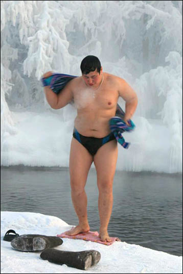 A brave swimmer peels off for a dip in an icy pool in Oymyakon, the coldest inhabited settlement in the world.  