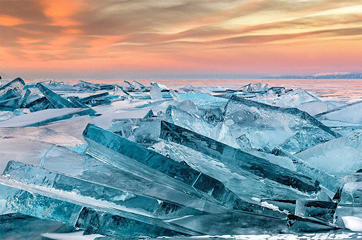 Teeing off for golf contest on frozen surface world’s deepest lake