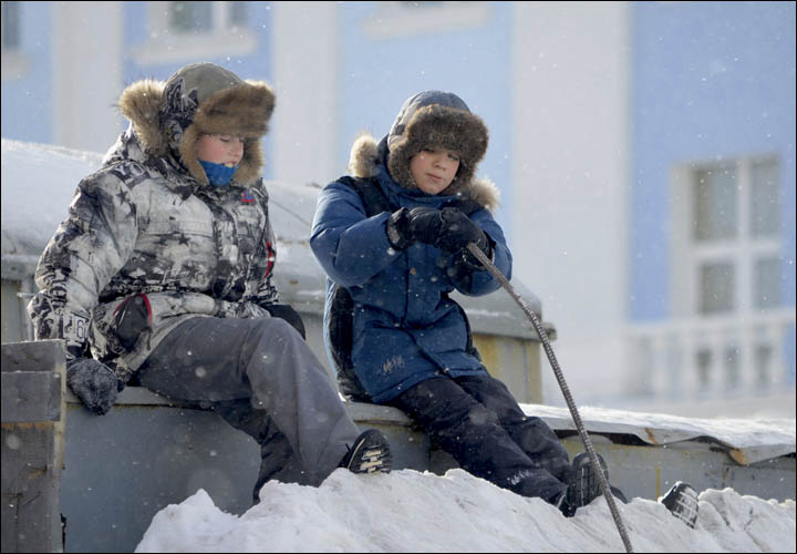 Children playing in the snow