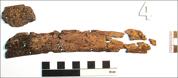 First pictures of 'unique' Bronze Age warlord's full battle dress may be a 'war trophy'.