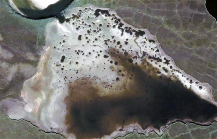 Half-dry lake with craters