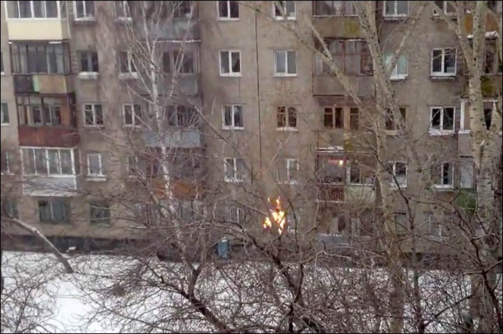 Teenager is set on fire before diving five floors into pile of snow.  