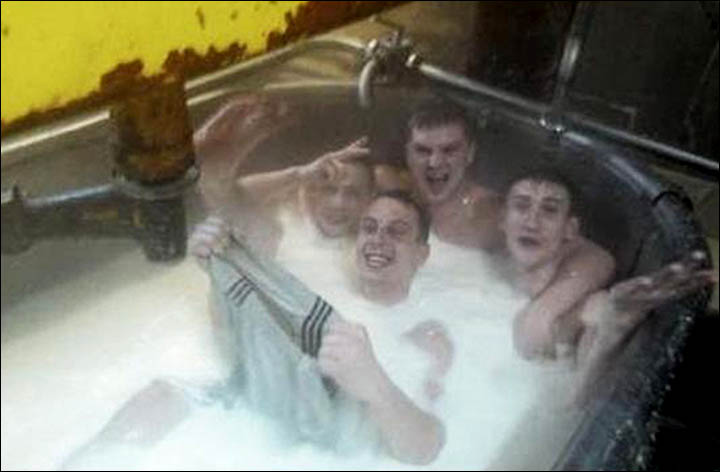 Naked cheese-makers pose in a vat filled with milk in 'sickening' picture