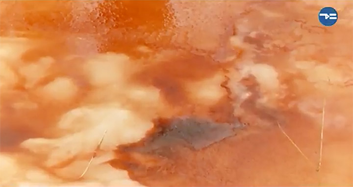 river turns bloody red in Siberia 