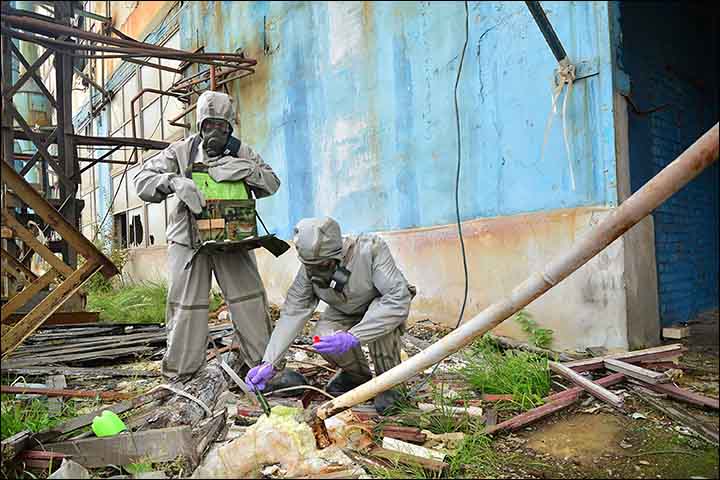 Military experts work at the site