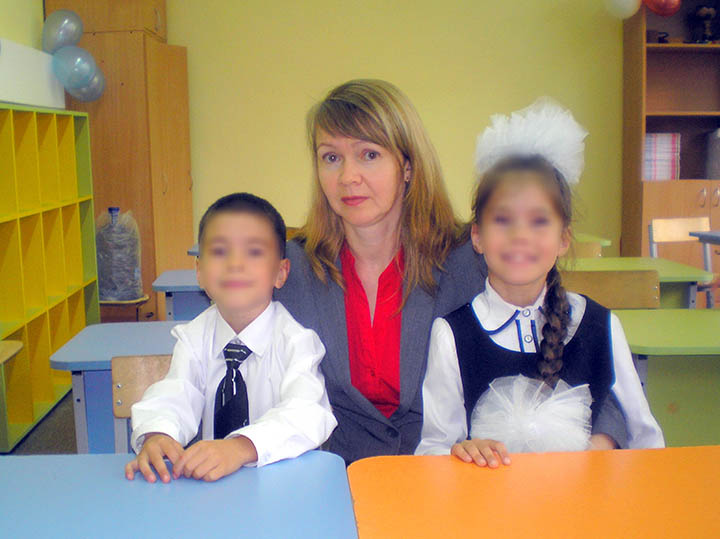 Oleg's wife Irina with kids