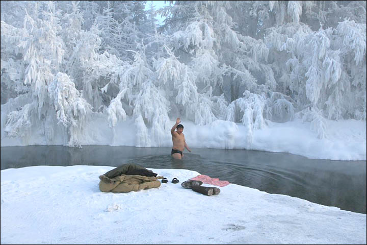 A brave swimmer peels off for a dip in an icy pool in Oymyakon, the coldest inhabited settlement in the world.  