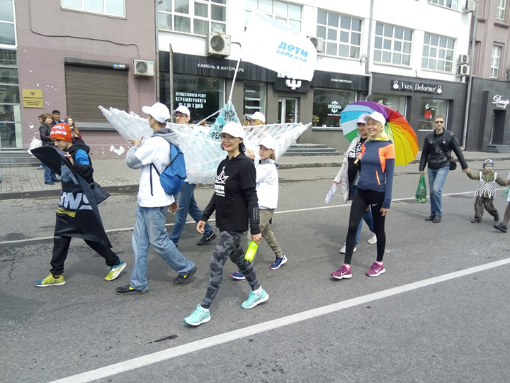 Flash of colour on grey day as Irkutsk celebrates one of Russia’s few carnivals inspired by locals