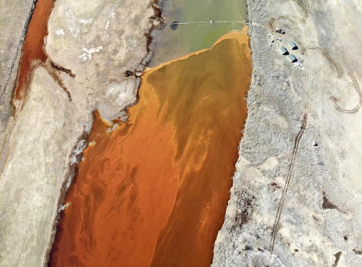 Toxic fuel from 21,000 ton leak reaches pristine lake, bypassing floating booms, as ‘rivers of diesel’ pollution cover-up is exposed