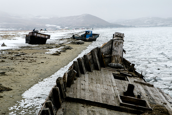 Photographer captures eerie graveyard of North Korean schooners scattered along the Russian coast