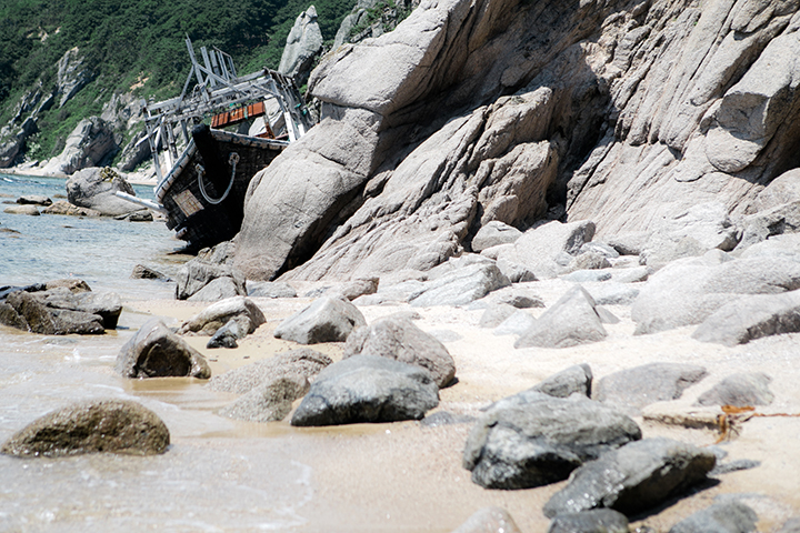 Photographer captures eerie graveyard of North Korean schooners scattered along the Russian coast