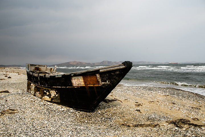 Photographer captures eerie graveyard of North Korean schooners scattered along the Russian coast