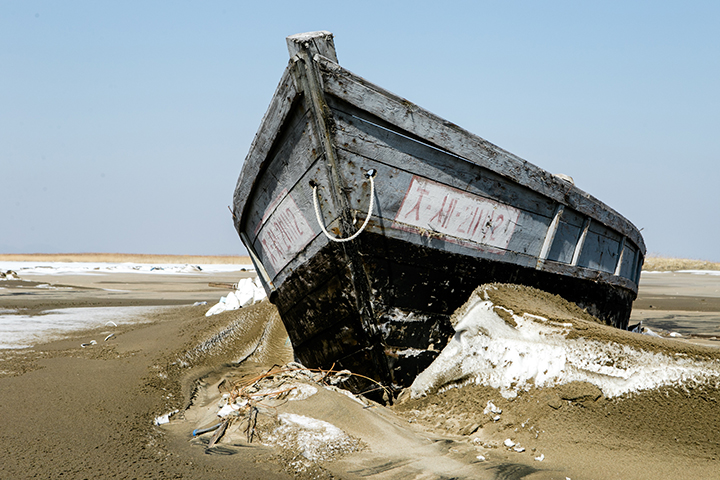 Photographer captures eerie graveyard of North Korean schooners scattered along the Russian coast