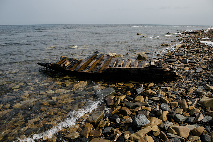 Photographer captures eerie graveyard of North Korean schooners scattered along the Russian coast