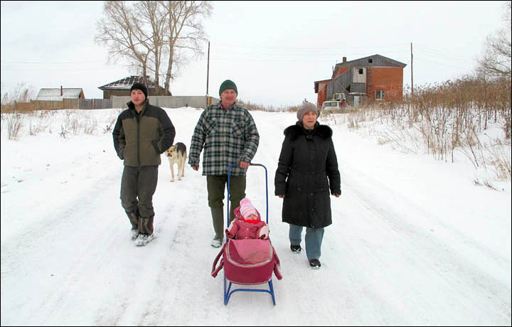 Ware family walking with Polina