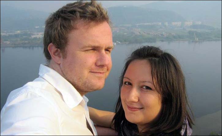 Michael Oliver-Semenov with wife Anastasia